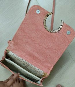 Chic Pink Crossbody Bag with Gold Accent