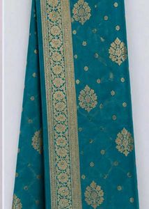 Blue Saree with bangles and earrings