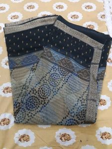 Elegant Black Saree with Blue Bandhej  Print