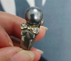 Elegant Pearl and Diamond Ring