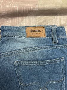 Distressed Blue Denim Jeans