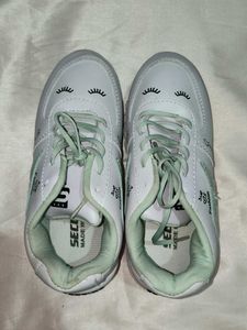 White Sneakers with Cute Eyelash Design