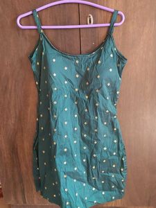 Bottle green brocade sleeveless kurti