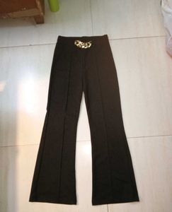 High rise Black Flare Pants with Gold Chain Detail