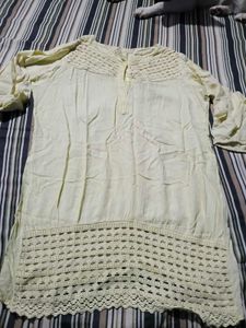 Elegant Yellow Kurta with Lace Detail