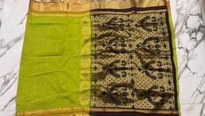 Vibrant Green Saree with Peacock Motif