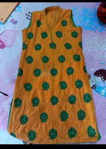 Orange Kurti with Green Leaf Print