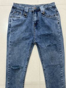 Distressed Blue Denim Jeans