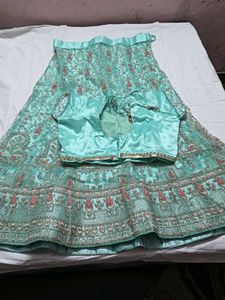 Stunning Teal Embroidered Lehenga Choli