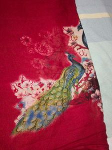 Vibrant Red Saree with Peacock Print