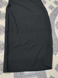 side slit black skirt medium length