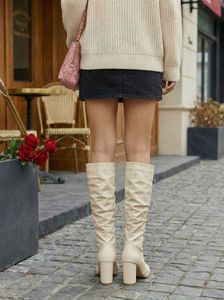 Cream Knee-High Boots