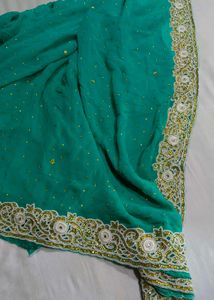 Elegant Teal Embroidered Saree...