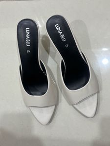 Elegant White Heeled Mules