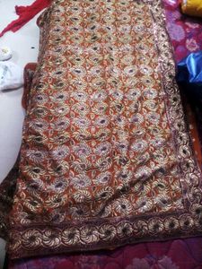 Elegant Orange Embroidered Saree
