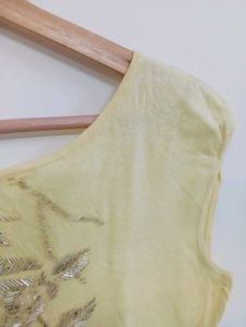 Elegant Yellow Embroidered Sleeveless Blouse