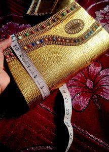 Elegant Gold Embellished Clutch Bag