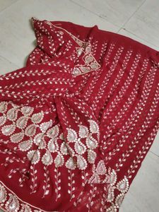 Elegant Maroon Embroidered Saree
