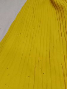 mustard colour plazo and off white top