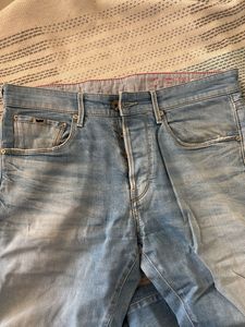 Light Wash Distressed Denim Jeans
