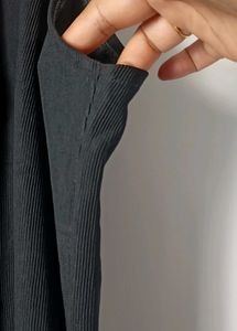 Sleeveless Vest with Buckle Detail