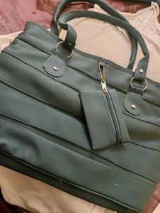 Chic Teal Handbag with Matching Pouch