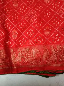 Vibrant Red Bandhani Saree with Elephant Border