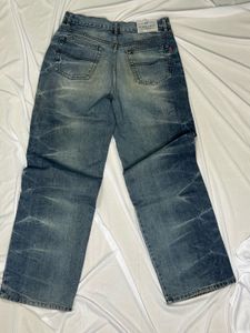 Distressed Blue Denim Jeans