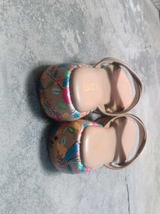 Stylish Tan Flat Sandals with Floral Print