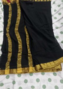 Elegant Black Saree with Golden Border