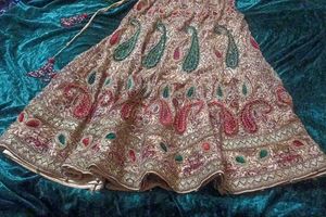 golden lehenga with maroon dupatta