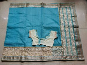 Elegant Teal Saree with Gold Embroidery