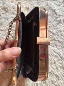 Elegant Red Clutch with Gold Accent