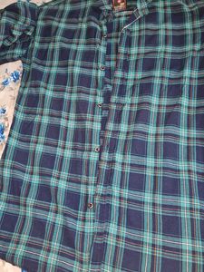 Classic blue and teal checkered full-sleeve shirt.
