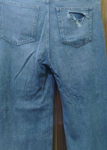 Ripped Blue Denim Jeans