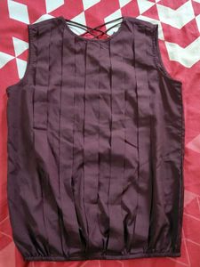 Sleeveless Pleated Top with Criss-Cross Back