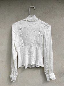 Elegant White Ruffled Blouse