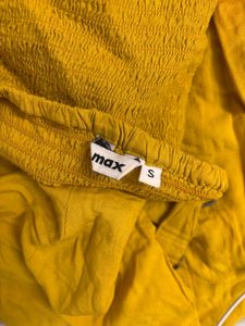 yellow embroidered midi dress
