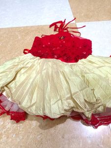 red  and beige colour frock