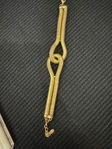 Chic Gold Tone Twisted Bracelet
