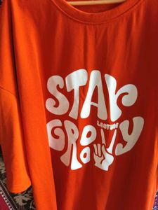 Orange "Stay Groovy" Graphic Tee