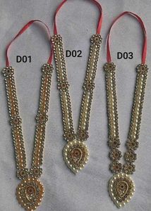 Fancy Pooja Articles. Haar For God Idols.