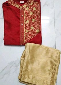 man's red sherwani