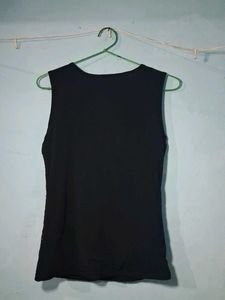 combo of Sleek Black Sleeveless Top and pink to