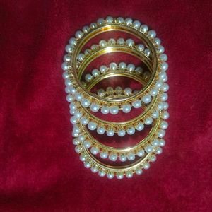 Elegant Pearl Bangles - Set of Four