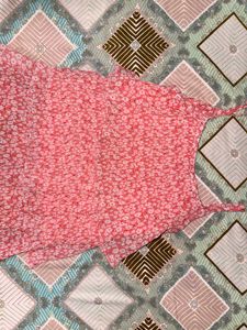 Pink sleeveless strip floral top