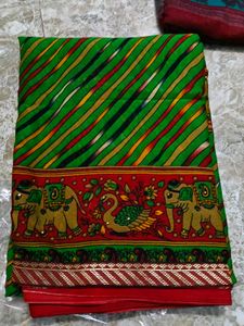 Vibrant Striped Saree with Elephant Border