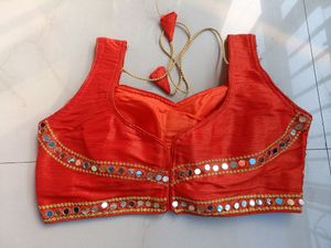 orange mirror work sleeveless blouse
