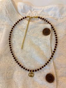 Elegant Beaded Necklace with Charm
