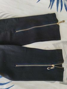 Chic Black Pants with Gold Zippers
